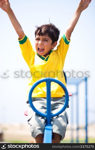 Smart kid having fun, outdoors and enjoying his day