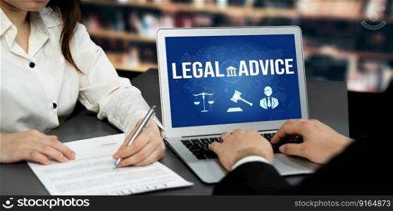 Smart legal advice website for people searching for astute law knowledge in laptop computer on a desk in library of university or college. Smart legal advice website for people searching for astute law knowledge