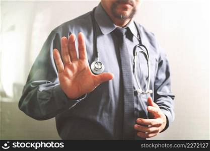 smart medical doctor opening his hand, touch screen computer,stethoscope ,front view,filter effect
