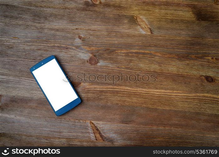 smart phone on old wooden background