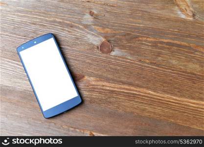 smart phone on old wooden background