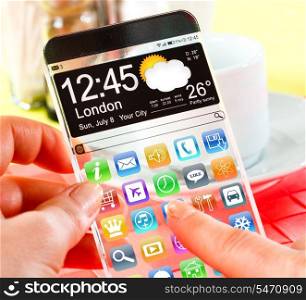 Smart phone (phablet) with a transparent display in human hands. Concept actual future innovative ideas and best technologies humanity.