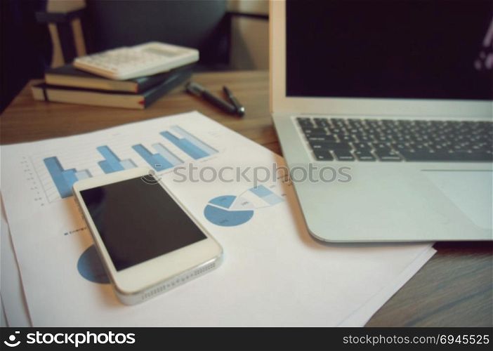 Smart phone with laptop. Business technology concept.
