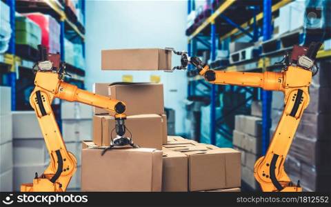 Smart robot arm system for innovative warehouse and factory digital technology . Automation manufacturing robot controlled by industry engineering using IOT software connected to internet network .. Smart robot arm system for innovative warehouse and factory digital technology