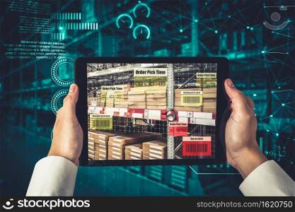 Smart warehouse management system using augmented reality technology to identify package picking and delivery . Future concept of supply chain and logistic business .. Smart warehouse management system using augmented reality technology