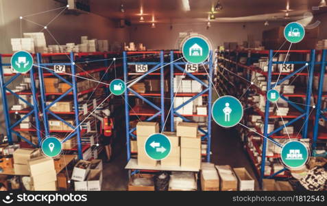 Smart warehouse management system with innovative internet of things technology to identify package picking and delivery . Future concept of supply chain and logistic network business .. Smart warehouse management system with innovative internet of things technology