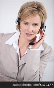 Smart woman wearing a telecommunications headset