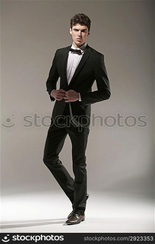 Smart young manl in fashion pose