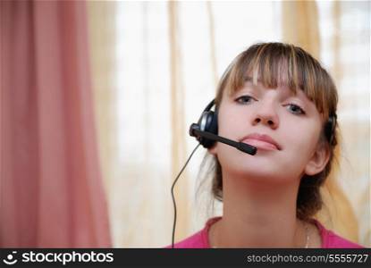 Smart young woman using head-set