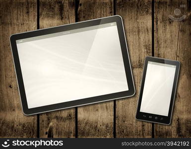 Smartphone and digital tablet PC on a dark wood table - horizontal office mockup. Smartphone and digital tablet PC on a dark wood table