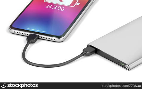 Smartphone charging with silver power bank, close-up