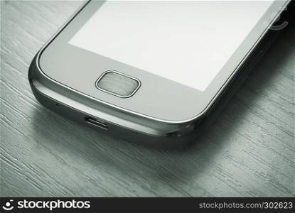 smartphone on the table. technology composition design.