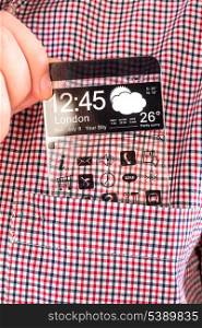 Smartphone (phablet) with a transparent display in a shirt pocket. Concept actual future innovative ideas and best technologies humanity.