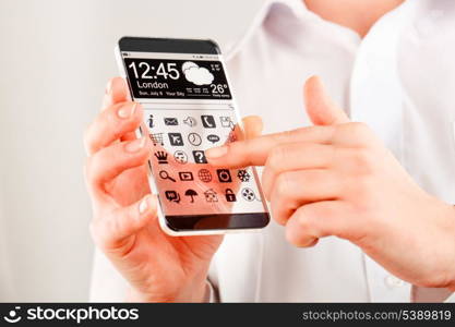 Smartphone (phablet) with a transparent display in human hands. Concept actual future innovative ideas and best technologies humanity.