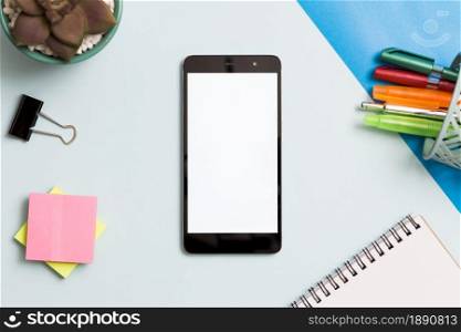 smartphone surrounded by office supplies. Resolution and high quality beautiful photo. smartphone surrounded by office supplies. High quality and resolution beautiful photo concept