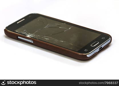 smartphone with broken screen on white background