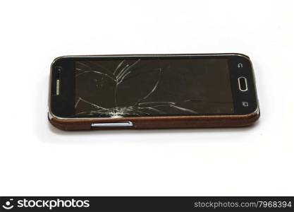smartphone with broken screen on white background