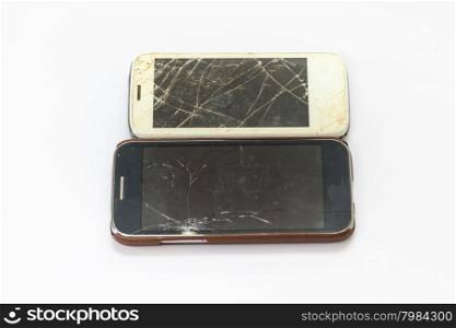 smartphone with broken screen on white background