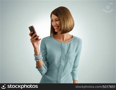 Smartphone woman using app on mobile smart phone smiling happy. Beautiful girl sms text messaging or using application