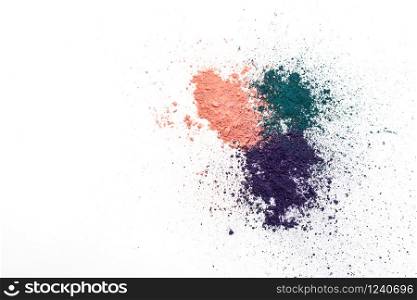 Smear of crushed multi colors as sample of cosmetics product isolated on white background with copy space.
