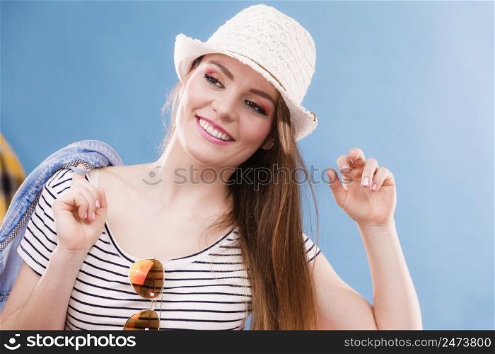 Smile and laugh. Vacation and rest. Portrait of happy lovely girl in straw hat. Young tourist woman enjoy holidays and summer time.. Happy cute tourist girl in straw hat.