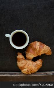 smile coffee with croissant at board