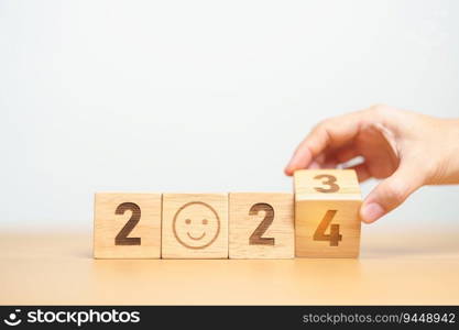 Smile face with 2024 block.  Satisfaction, feedback, Review, mental health, eco sustainable and Happy New Year concept