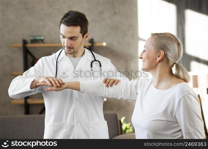 smiley doctor checking woman