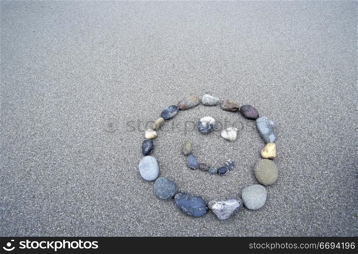 Smiley Face Drawn With Rocks