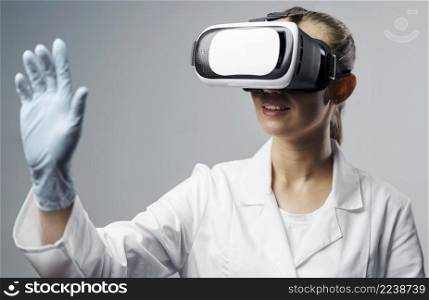 smiley female researcher using virtual reality headset