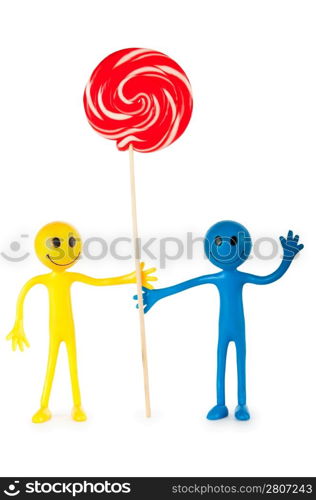 Smiley holding colourful lollipop isolated on white