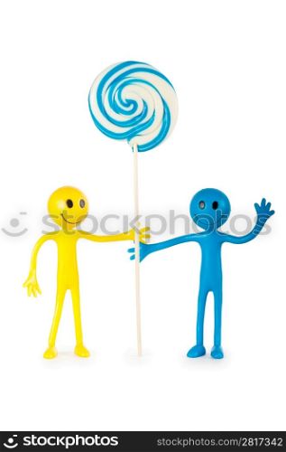 Smiley holding colourful lollipop isolated on white