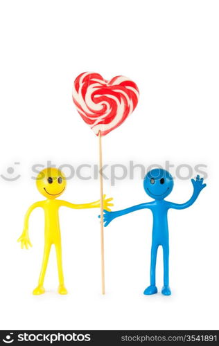 Smiley holding colourful lollipop isolated on white