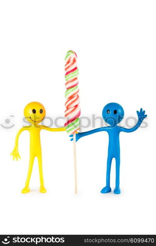 Smiley holding colourful lollipop isolated on white