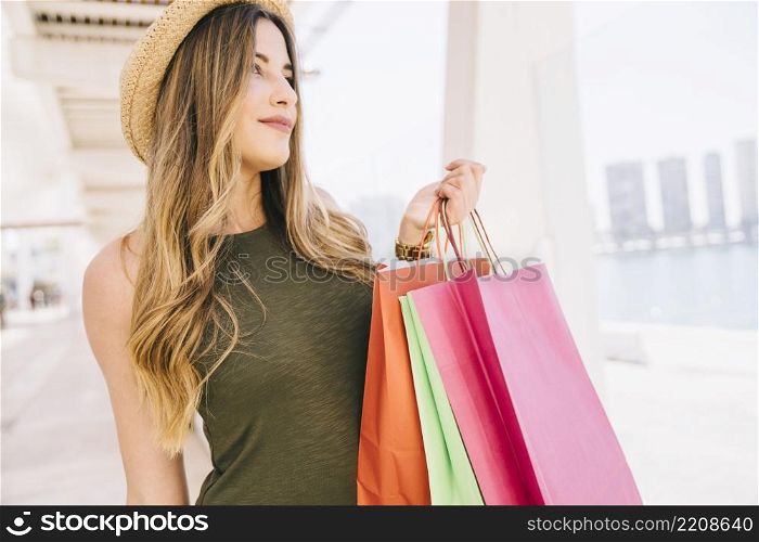 smiley model with shopping bags