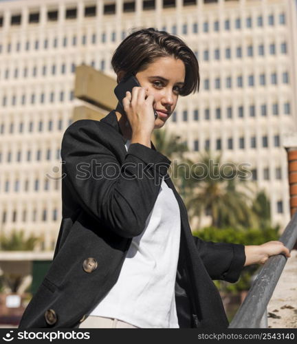 smiley stylish woman talking phone 2