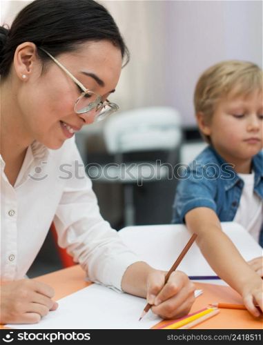 smiley teacher doing her class with kids