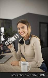 smiley woman doing radio