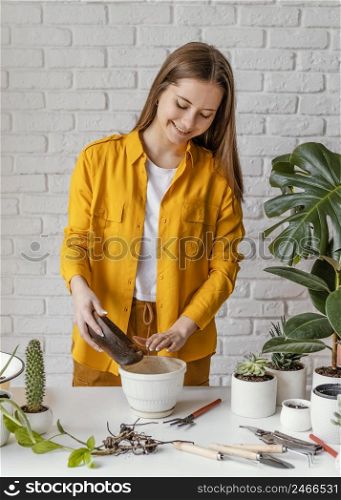 smiley woman gardening home 2