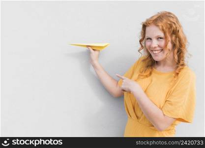 smiley woman paper plane