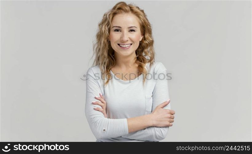 smiley woman with arms crossed