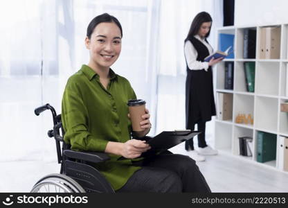 smiley woman with coffee working