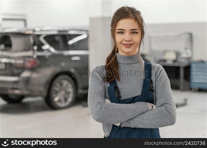 smiley woman working car service