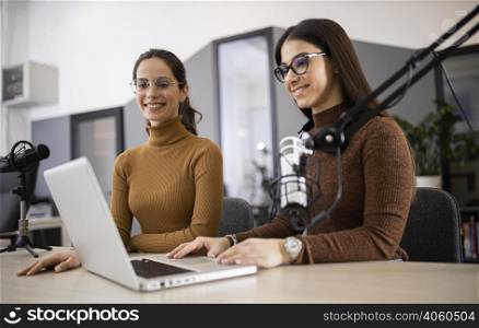 smiley women broadcasting radio