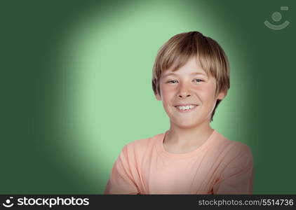 Smiling adolescent with a happy gesture on a over green background