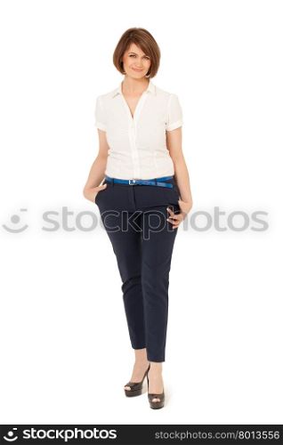 Smiling adult woman with short hair and elegant blouse, pants and high heels against of white background. Studio shot, isolated.