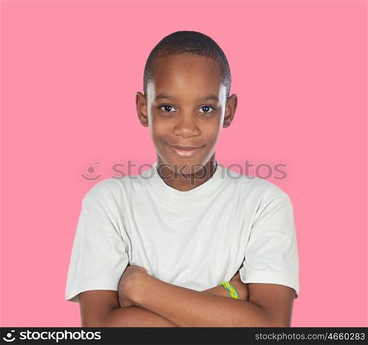 Smiling african adolescent with a happy gesture on a pink background