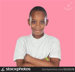 Smiling african adolescent with a happy gesture on a pink background