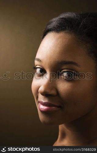 Smiling African-American young adult female looking at viewer