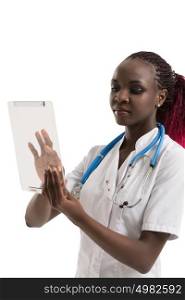 Smiling african doctor using a tablet computer on white background